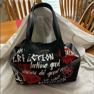 Guess purse with makeup pouch dust bag